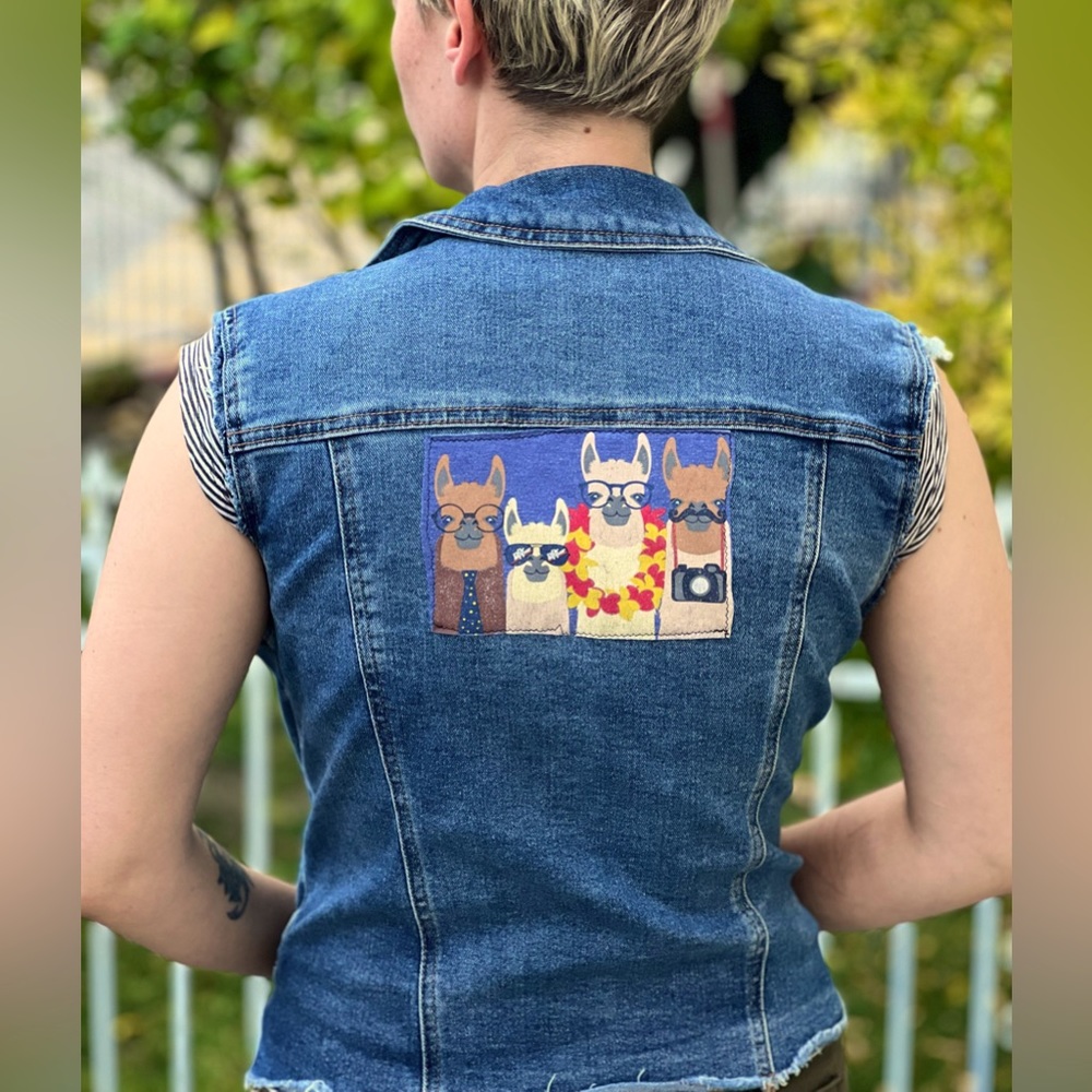 Blue jean vest upcycled with llama patches & additional pen pocket. Size medium